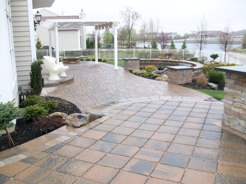 large patio with sheer descent water feature